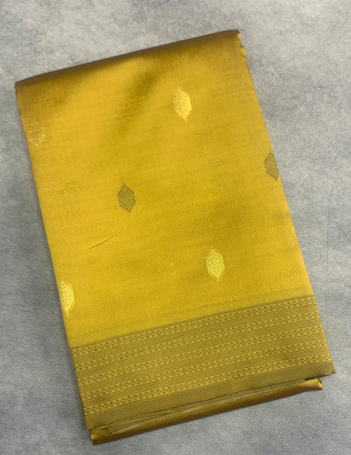 Mustard Colour Semi Soft Silk Saree with Butta and Silver Zari Border