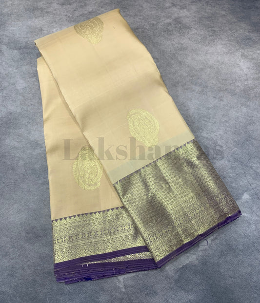 Cream Colour Pure Kanjivaram Silk Saree with Contrasting Deep Purple Border