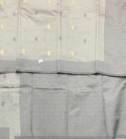 Light Grey Colour Semi Soft Silk Saree with Butta and Silver Zari Border