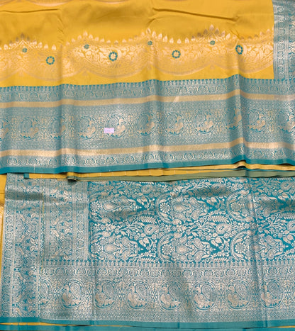Yellow Colour Satin Saree with Green Colour Ikat Border