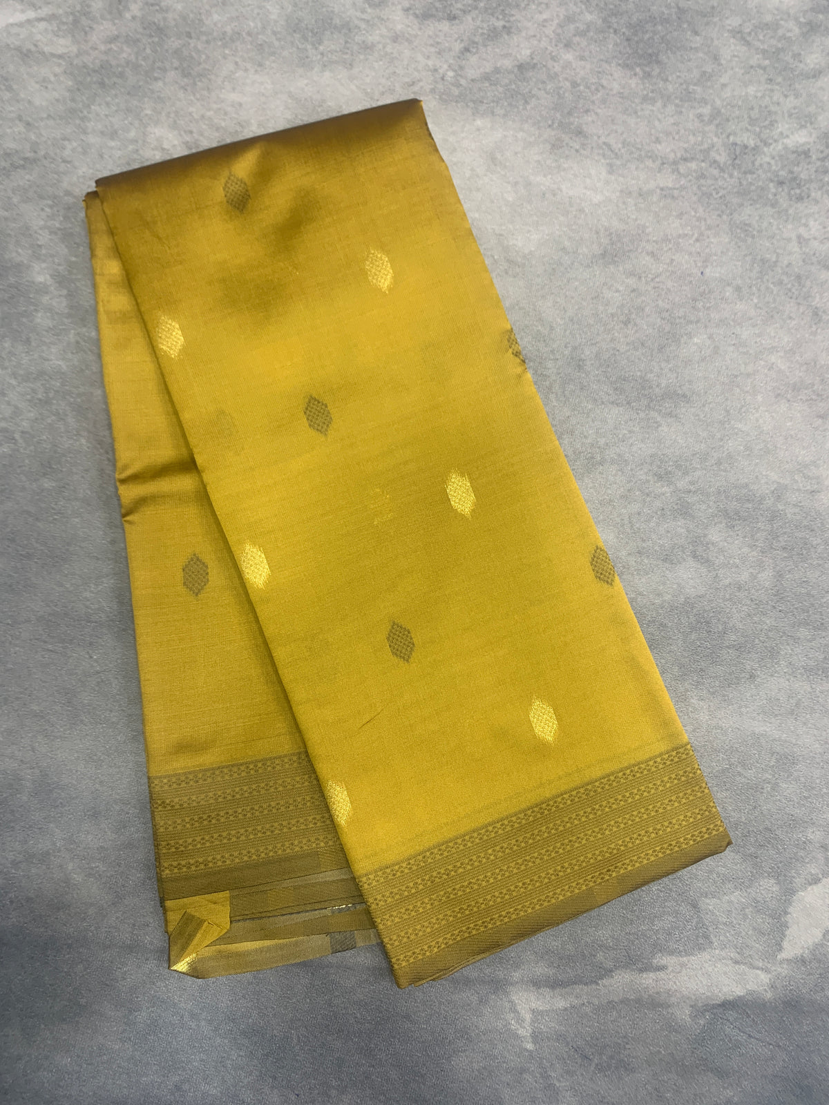 Mustard Colour Semi Soft Silk Saree with Butta and Silver Zari Border