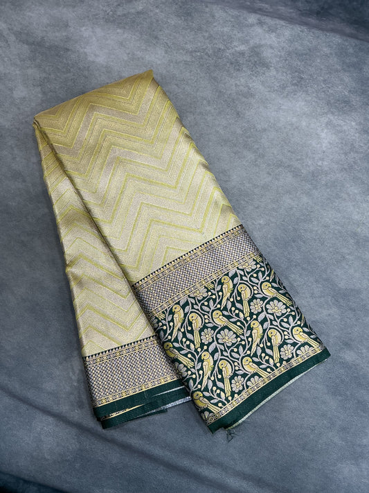 Yellow Color Tissue Saree with Contrast Green Color border