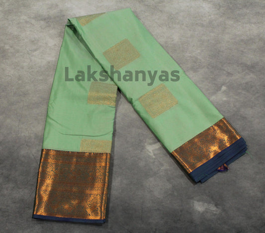 Pista Green Semi Silk Saree with Blue Border