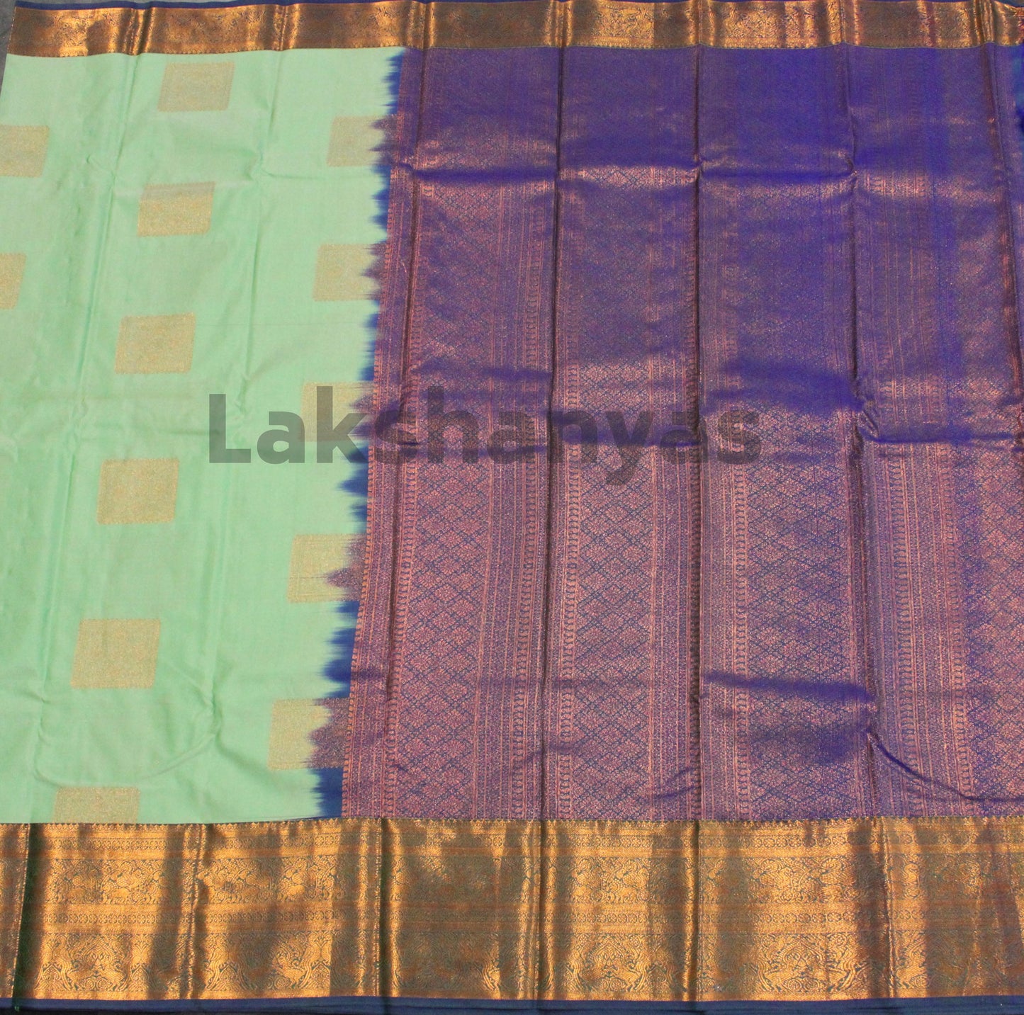 Pista Green Semi Silk Saree with Blue Border