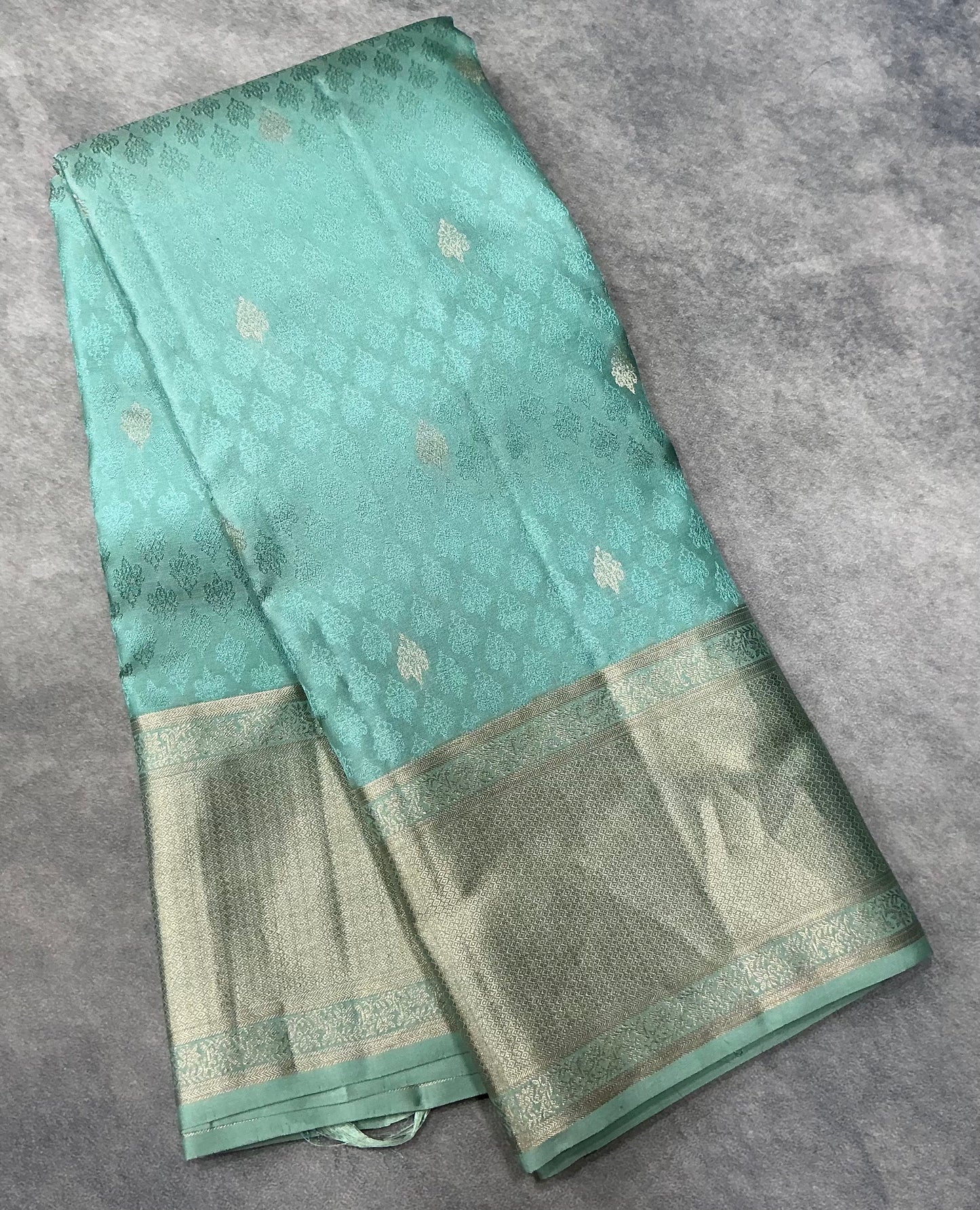 Teal Green Colour Kanjivaram Silk Saree with Zari Border