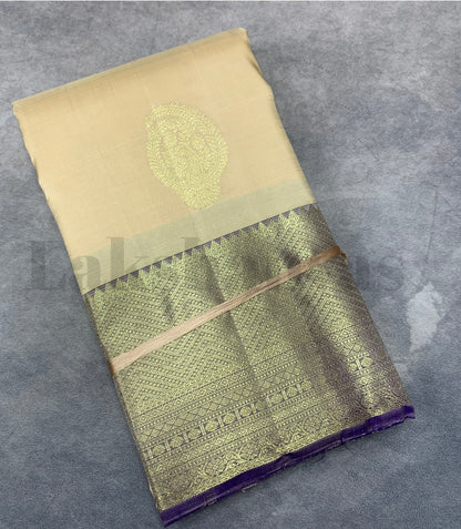 Cream Colour Pure Kanjivaram Silk Saree with Contrasting Deep Purple Border