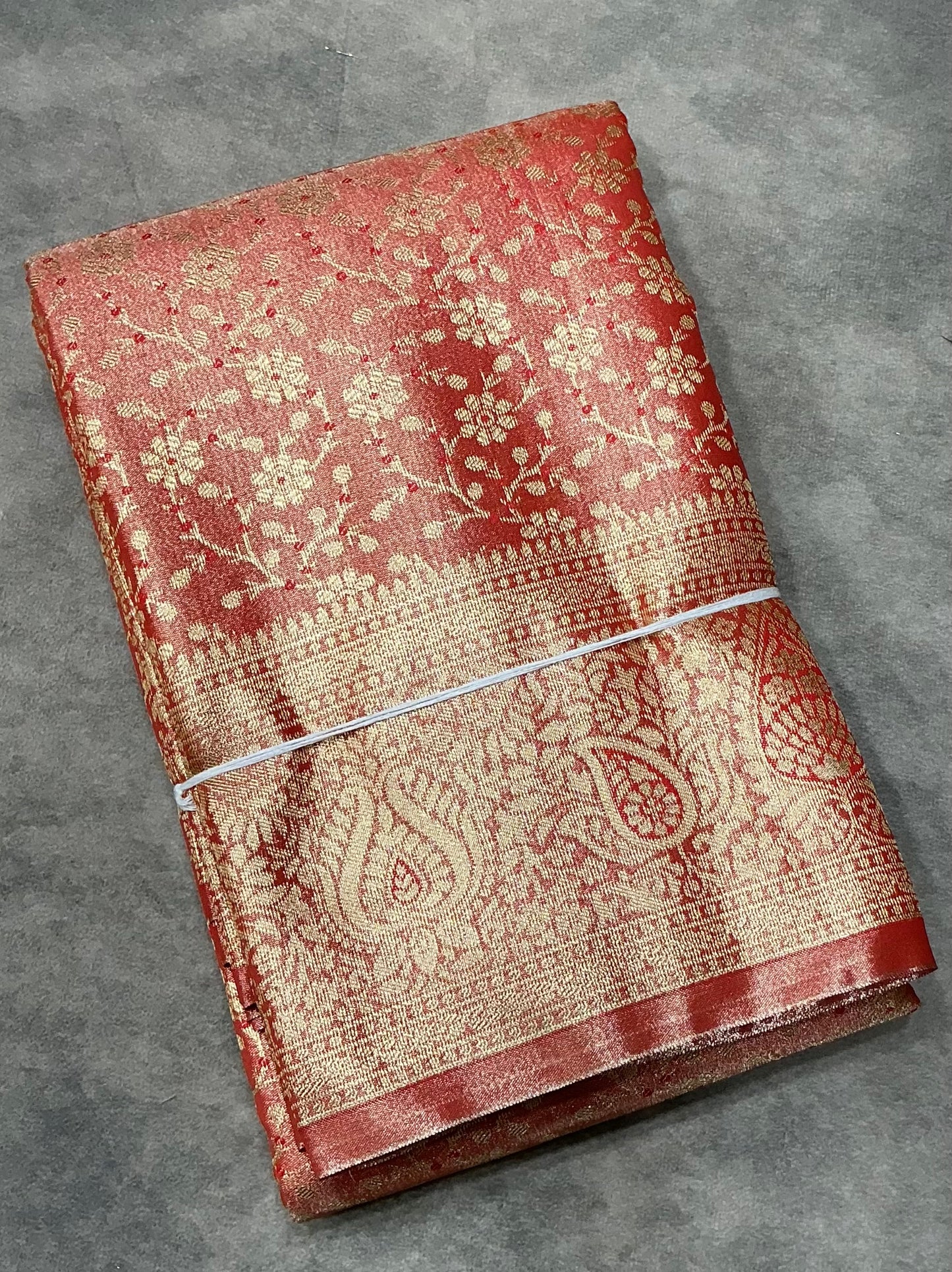 Orange Color Tissue Saree with Self Color Border