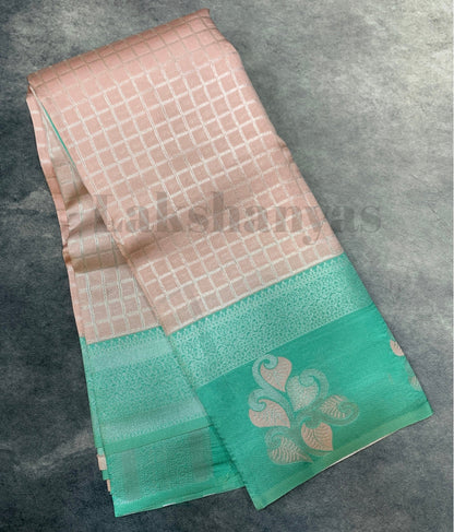 Pink Colour Tissue  Saree with Teal Green Colour Border