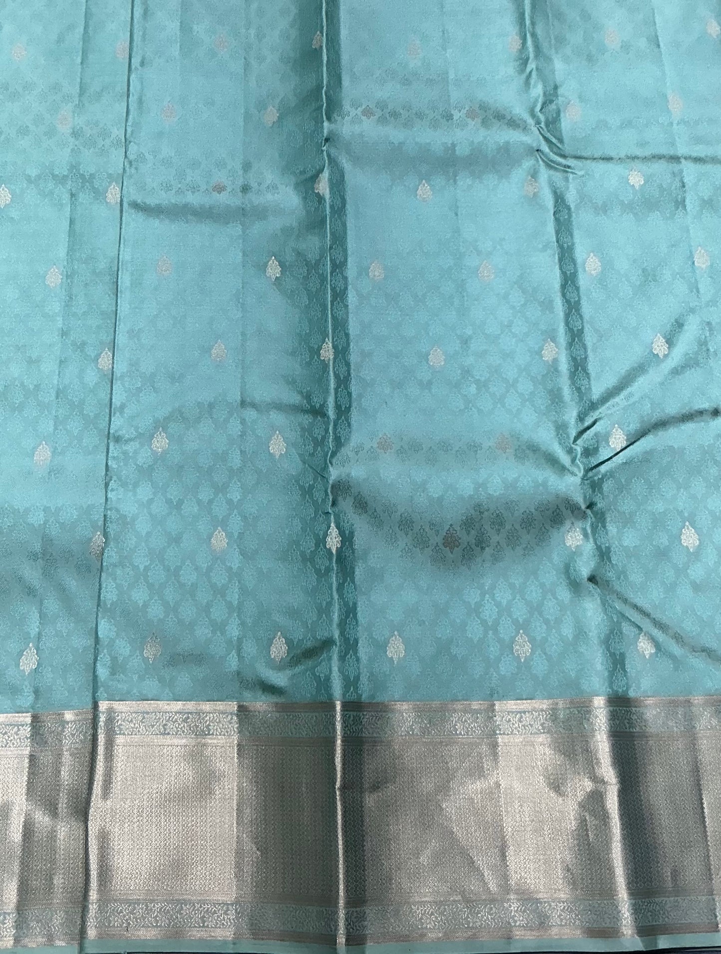 Teal Green Colour Kanjivaram Silk Saree with Zari Border